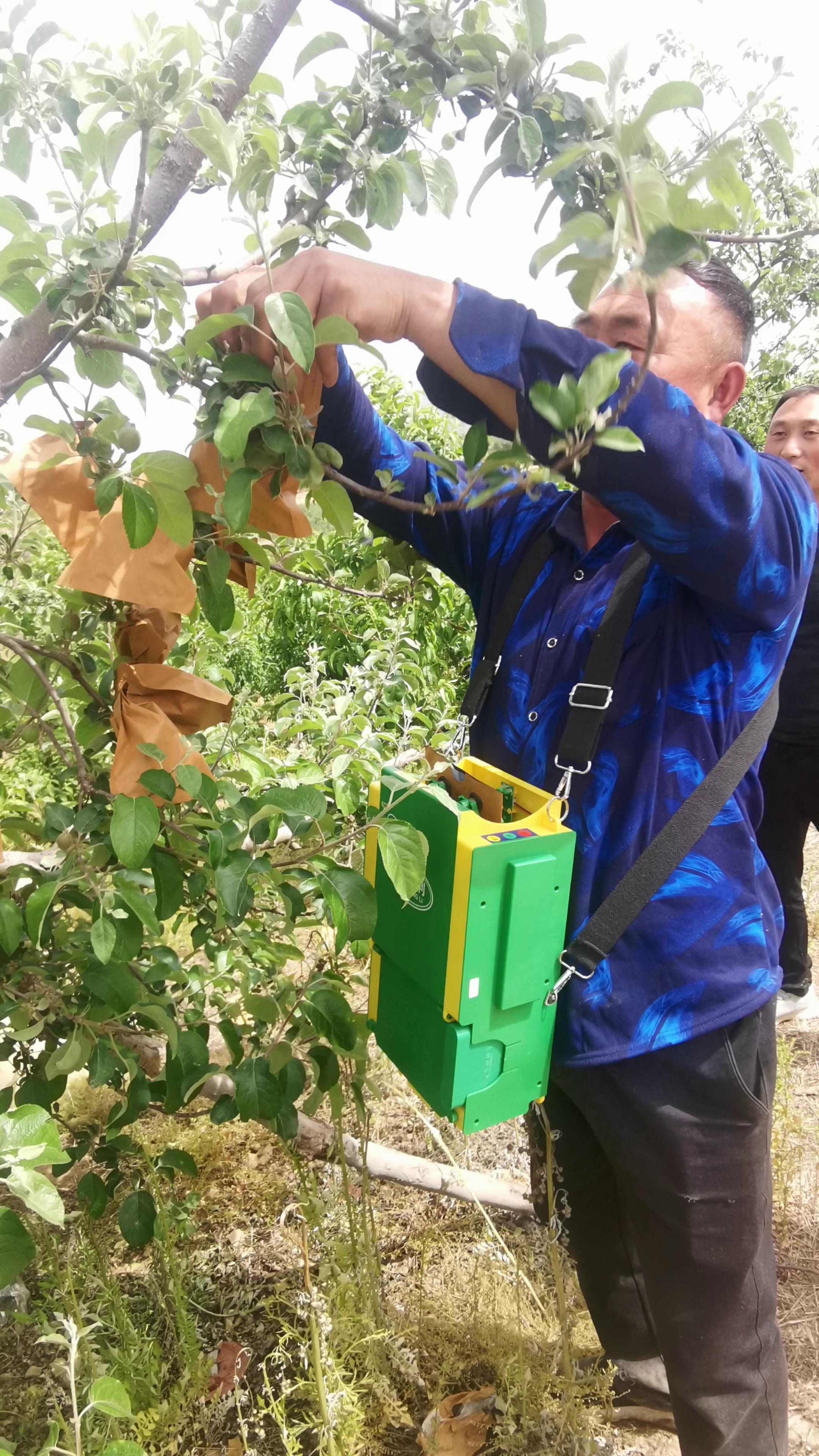 義中利自動水果紙袋梨桃蘋果套袋機撐口器蘋果套袋神器張口器包郵